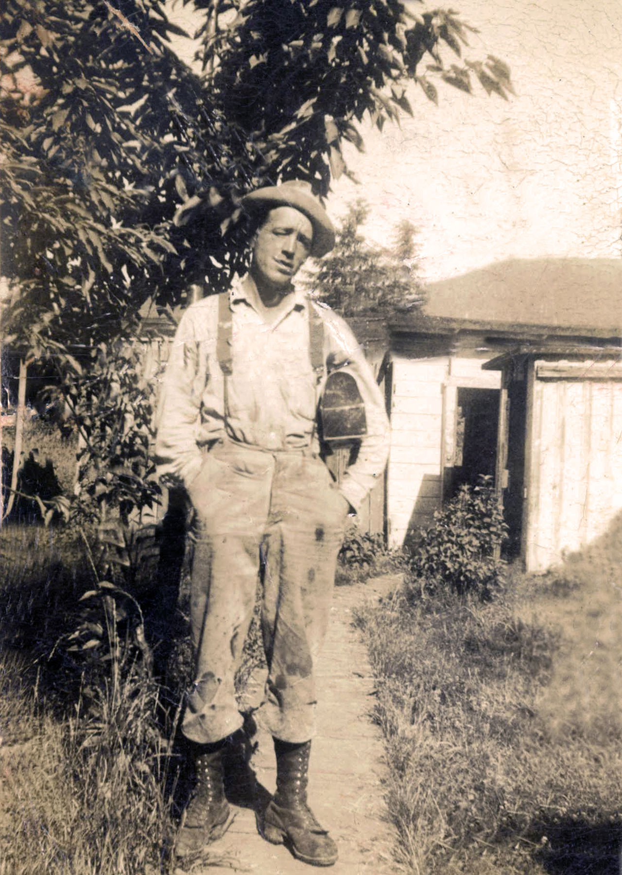 Guy Burch carrying his lunch pail, heading out to work in the woods. (Photo courtesy of Helen Burch Moreland.)