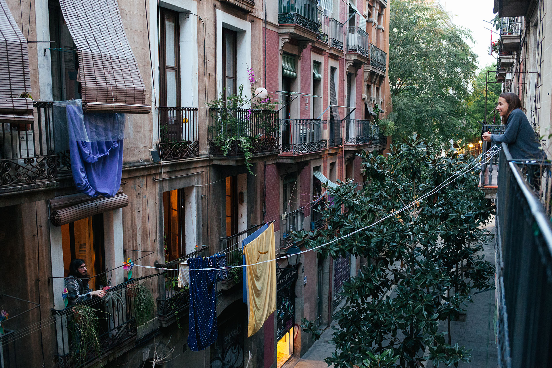 Our Barcelona neighbors, making friends from balcony to balcony (Photo by Jodi Cash)