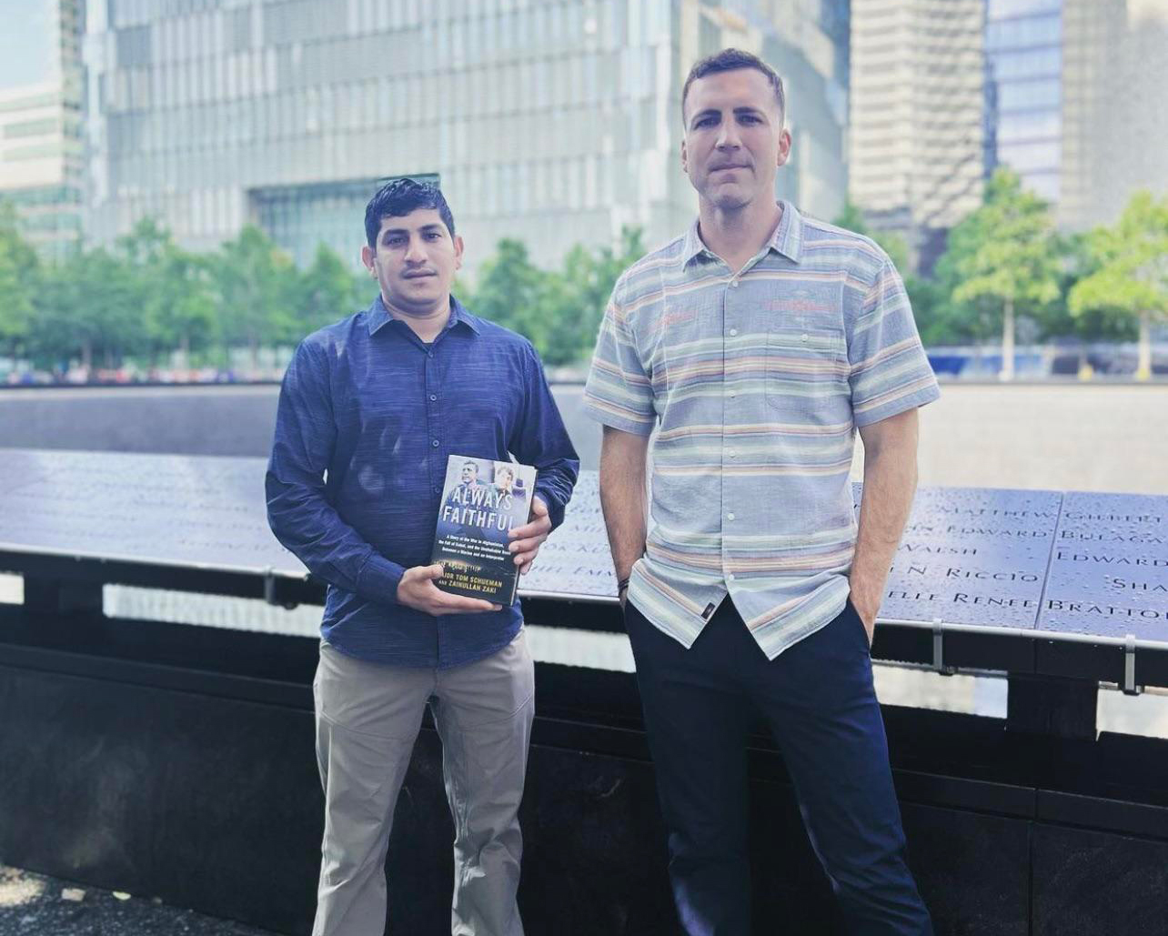 Zak and Marine Maj. Tom Schueman at the World Trade Center memorial in New York City.