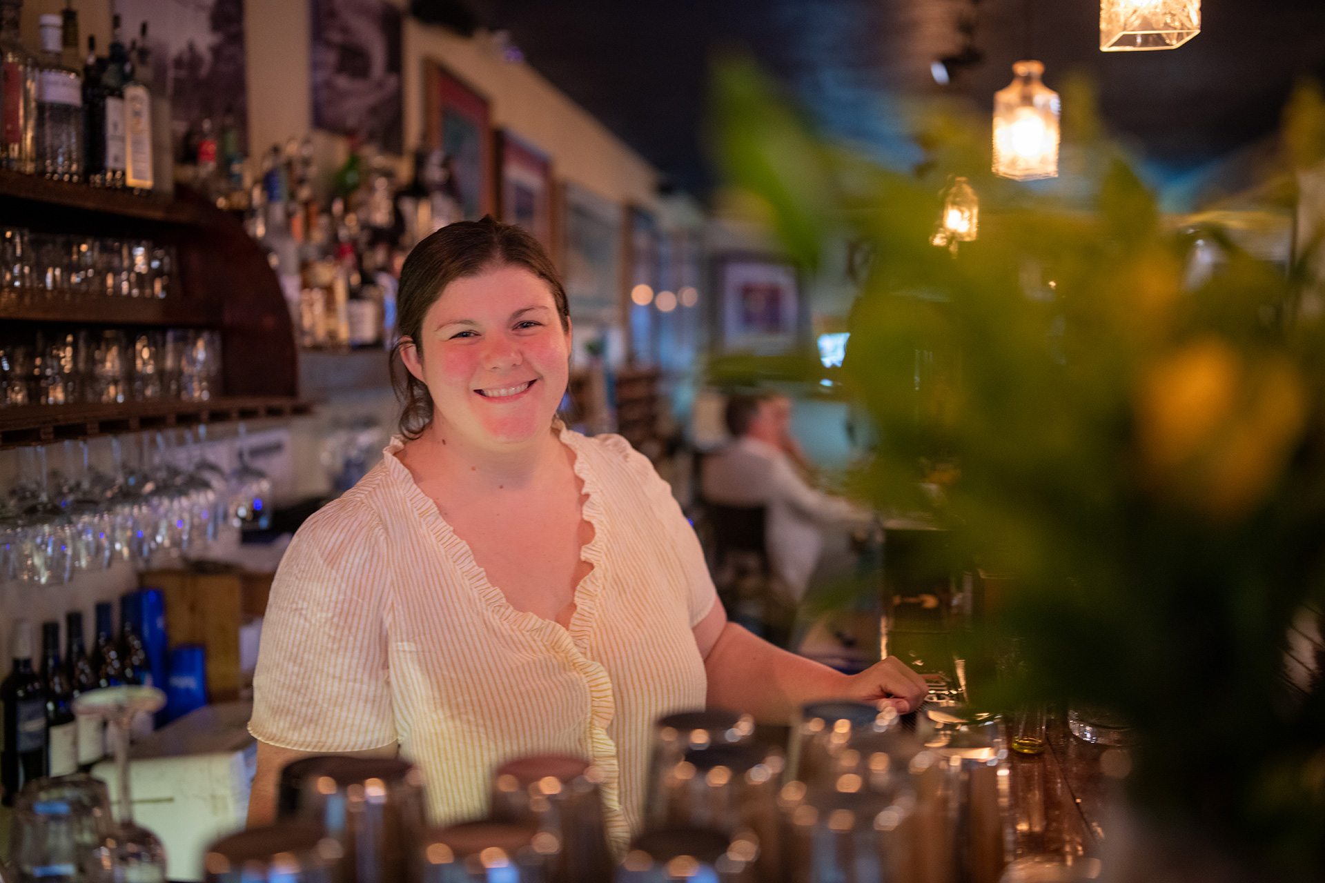 Restaurant namesake and manager Gabrielle Sonnier Prudhomme behind the bar at Gabrielle