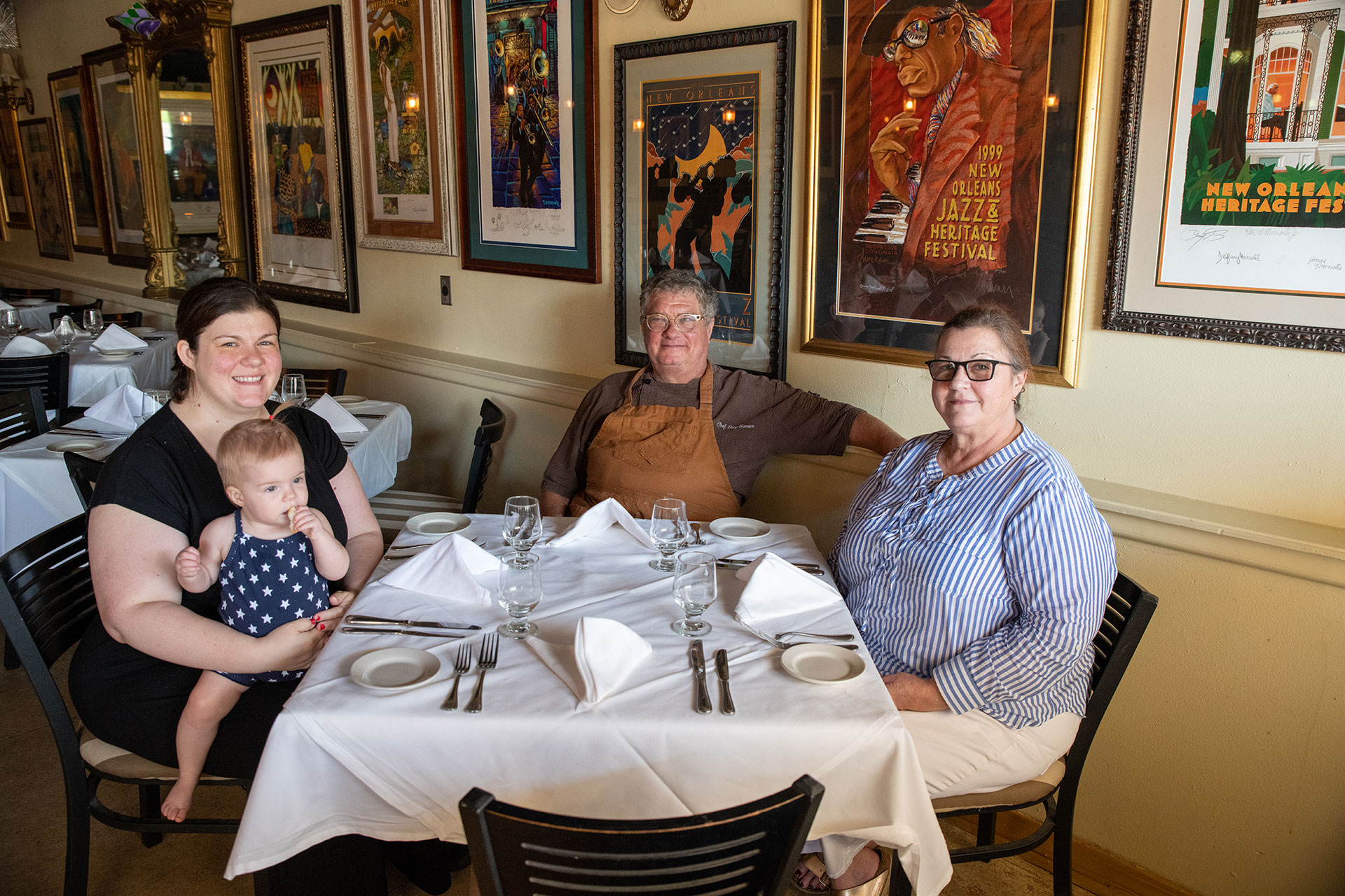 Chef Joel Sonnier with his wife Mary (right), his daughter Gabrielle (left) with her daughter Marigold