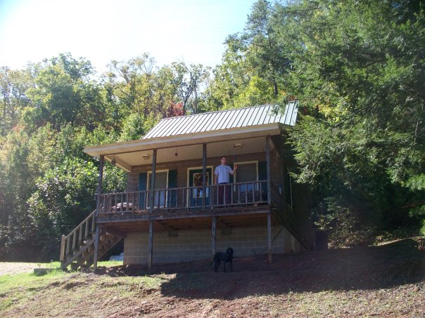 The author on the porch of his cabin in Porter Valley