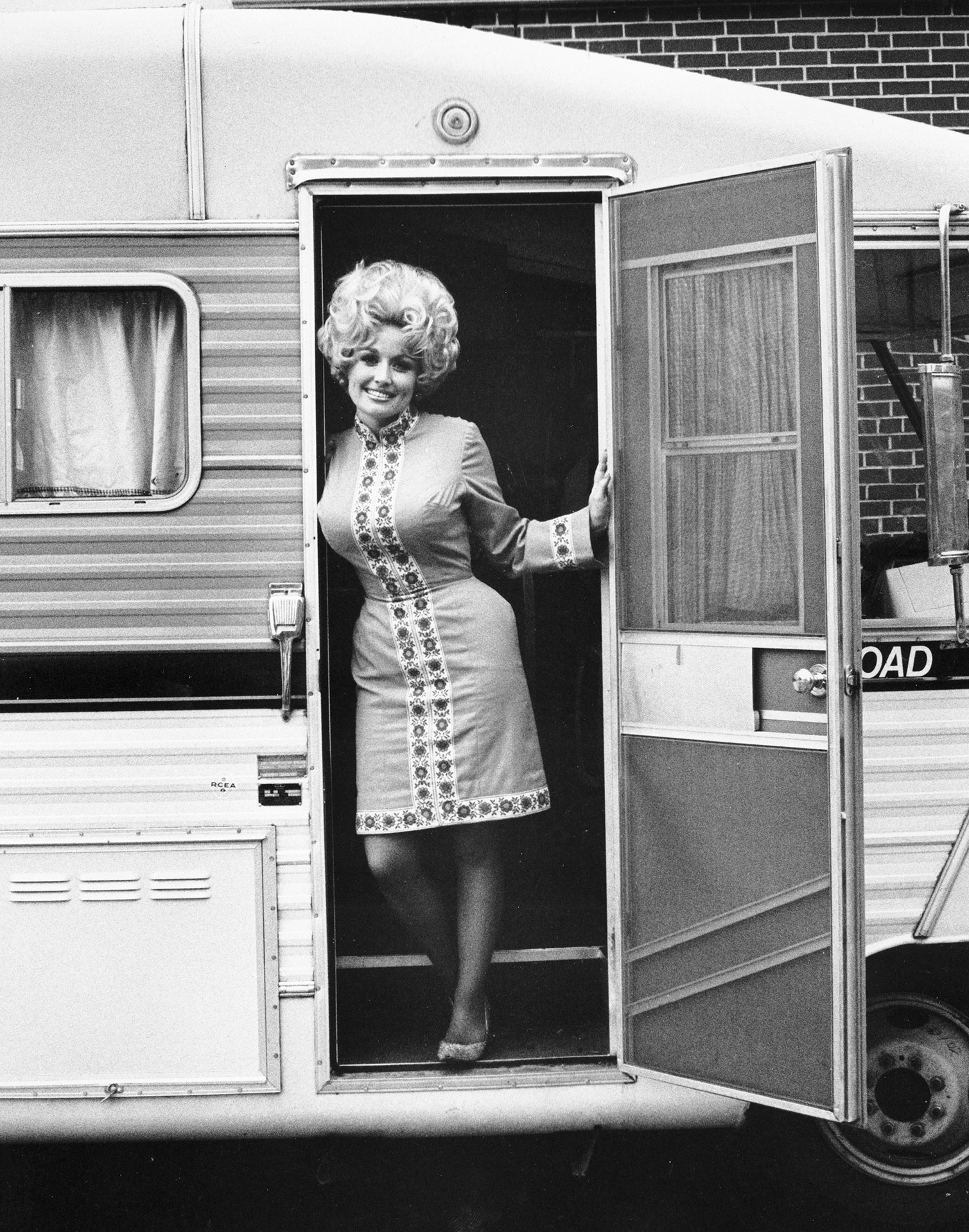 Dolly in the door of the Porter Wagoner tour bus in the 1960s (photo courtesy of Dolly Parton)