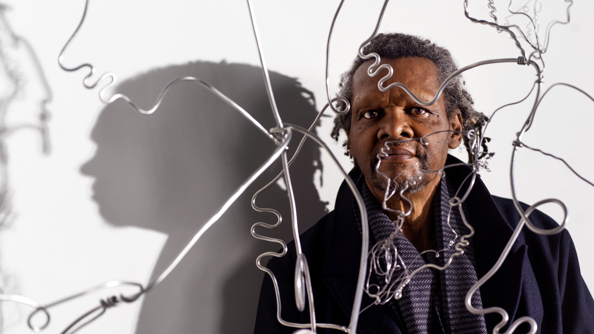 Lonnie Holley behind one of his sculptures (photograph by David Raccuglia)
