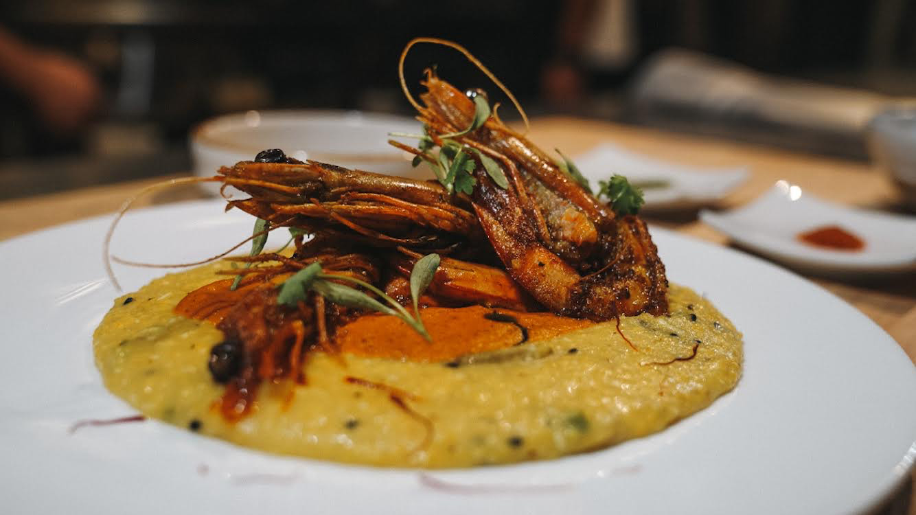 Spiced prawns and saffron grits at Roux 30A