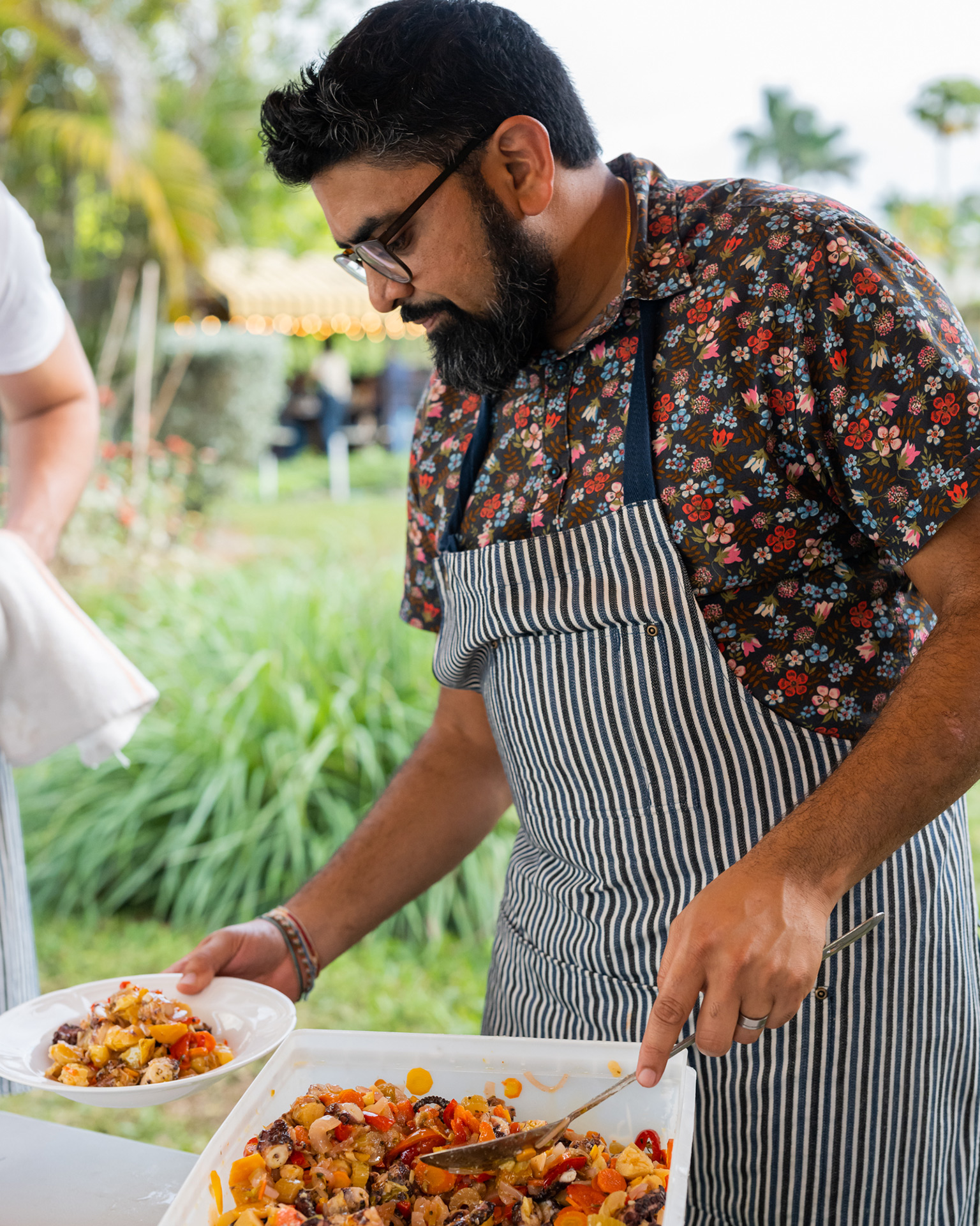 Chef Niven Patel, owner the Miami restaurants Ghee and Orno, cooks at his farm in Homestead, Florida (photograph by Adinayev).