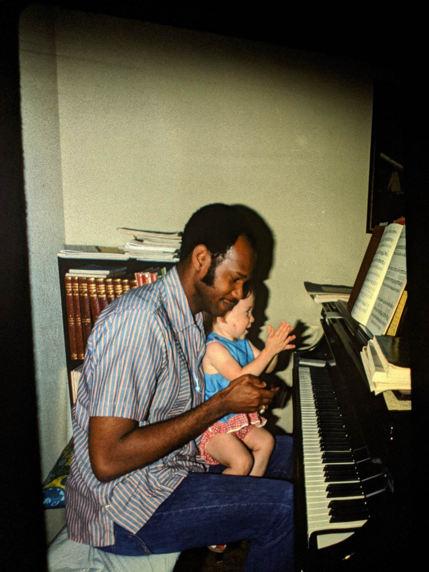 Shara Nova in the lap of her uncle, Donald Ryan, in the mid-1970s (photograph courtesy of Shara Nova)