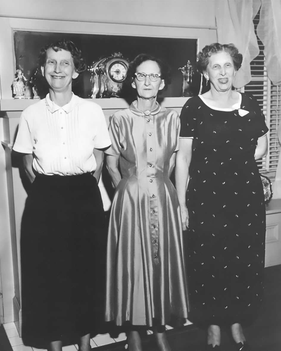 Cordelia Henderson Thompson, smiling at left, with her sisters Annie Embry and Ceph Atkins, who was known for sticking her tongue out at every photographer, in 1957. (Photograph by Doug Embry)