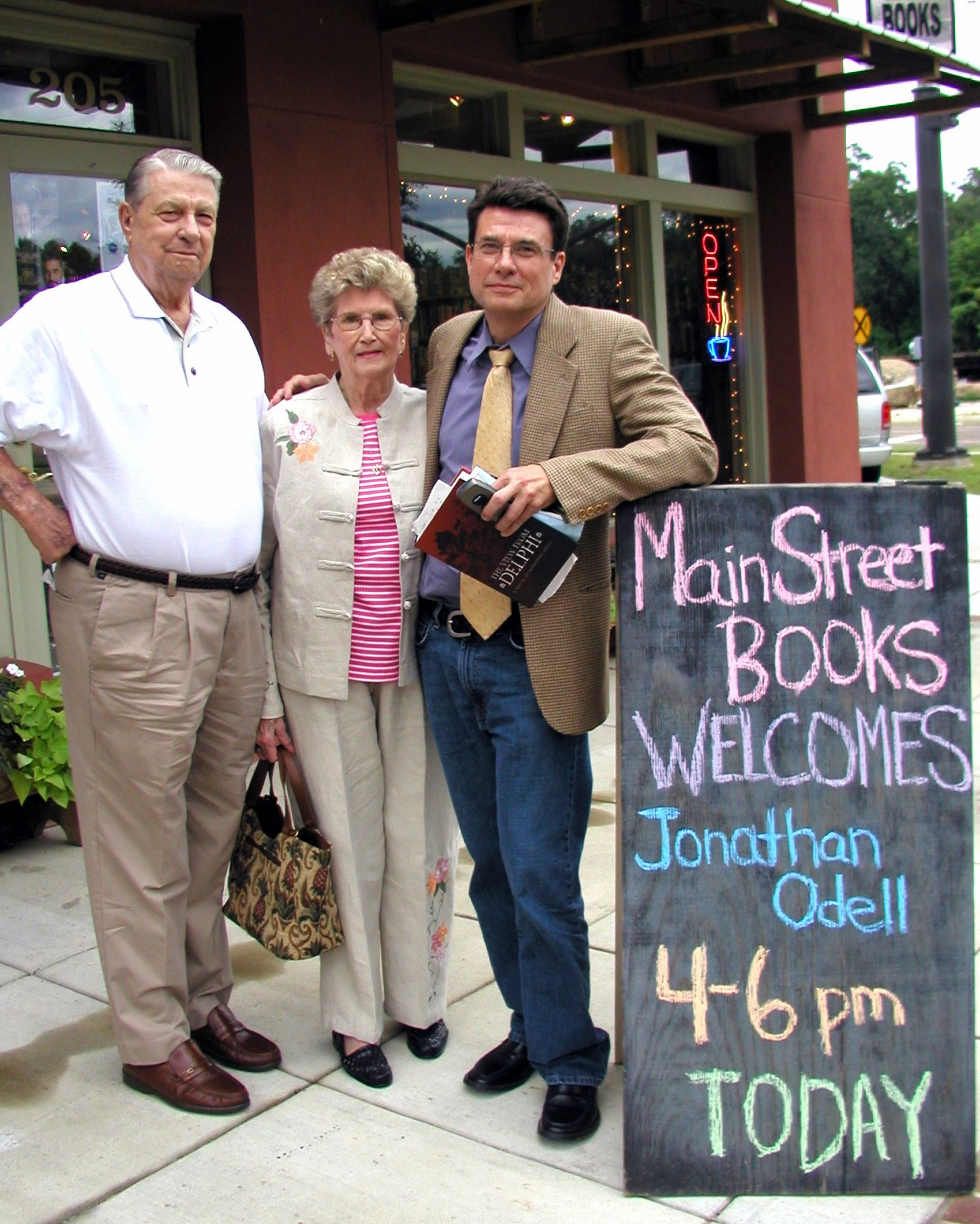 Jonathan Odell with his parents at a reading of his first novel in 2004.
