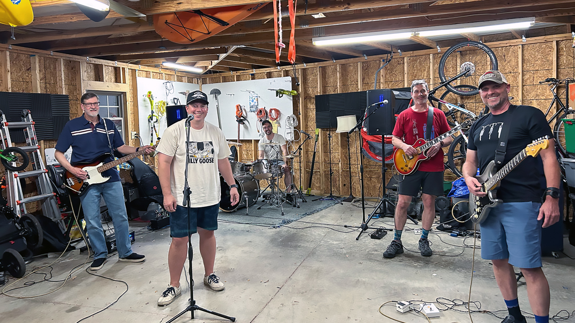 The Kensingtons, in a garage on Kensington Road, Homewood, Alabama: Bob Blalock on bass (retired PR guy), Ben Leach on lead vocals (banker), Dr. Sam Gentle on drums (neonatologist), Chris Horwedel on lead guitar (IT guy), and Ethan White on rhythm guitar (physical therapist)
