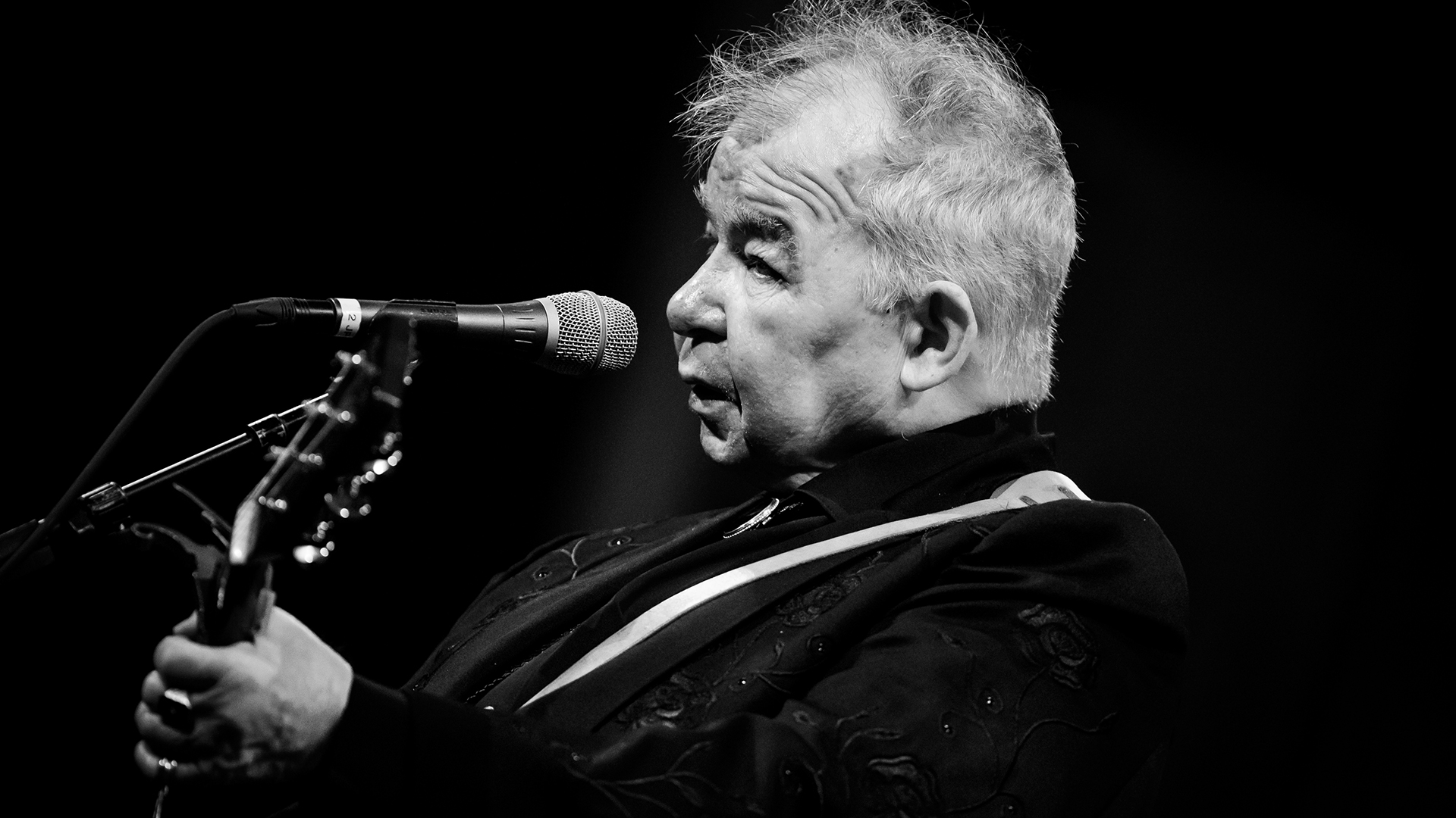 John Prine performing in 2019 (Photograph by Rich Fury/Getty Images)
