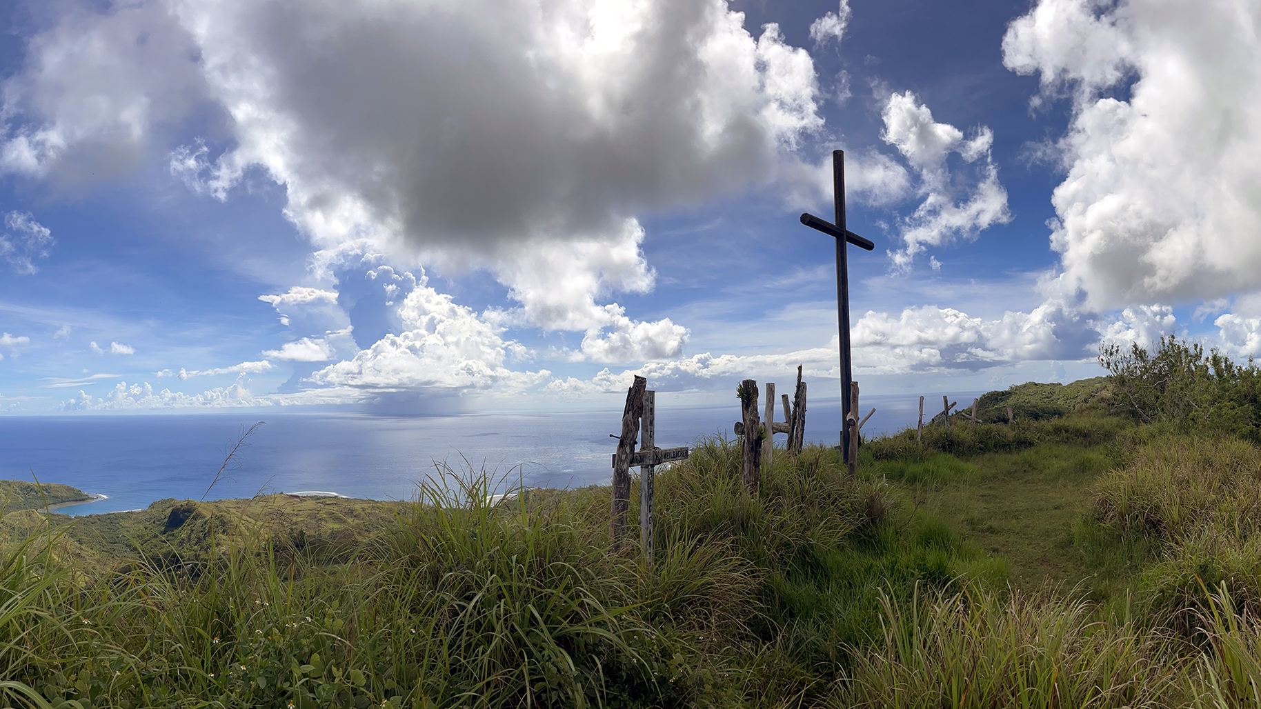 Wooden crosses serve as a memorial on the peak of Mount Lamlam near Agat, Guam (photograph by Russell Worth Parker).