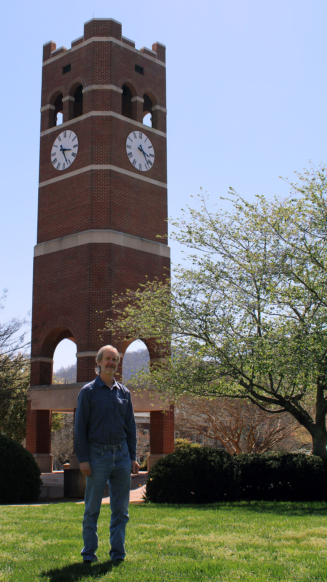 Rash the teacher: Ron Rash in front of the iconic Alumni Tower at Western Carolina University, where he teaches creative writing and Appalachian cultural studies (photograph by Marianne Leek)