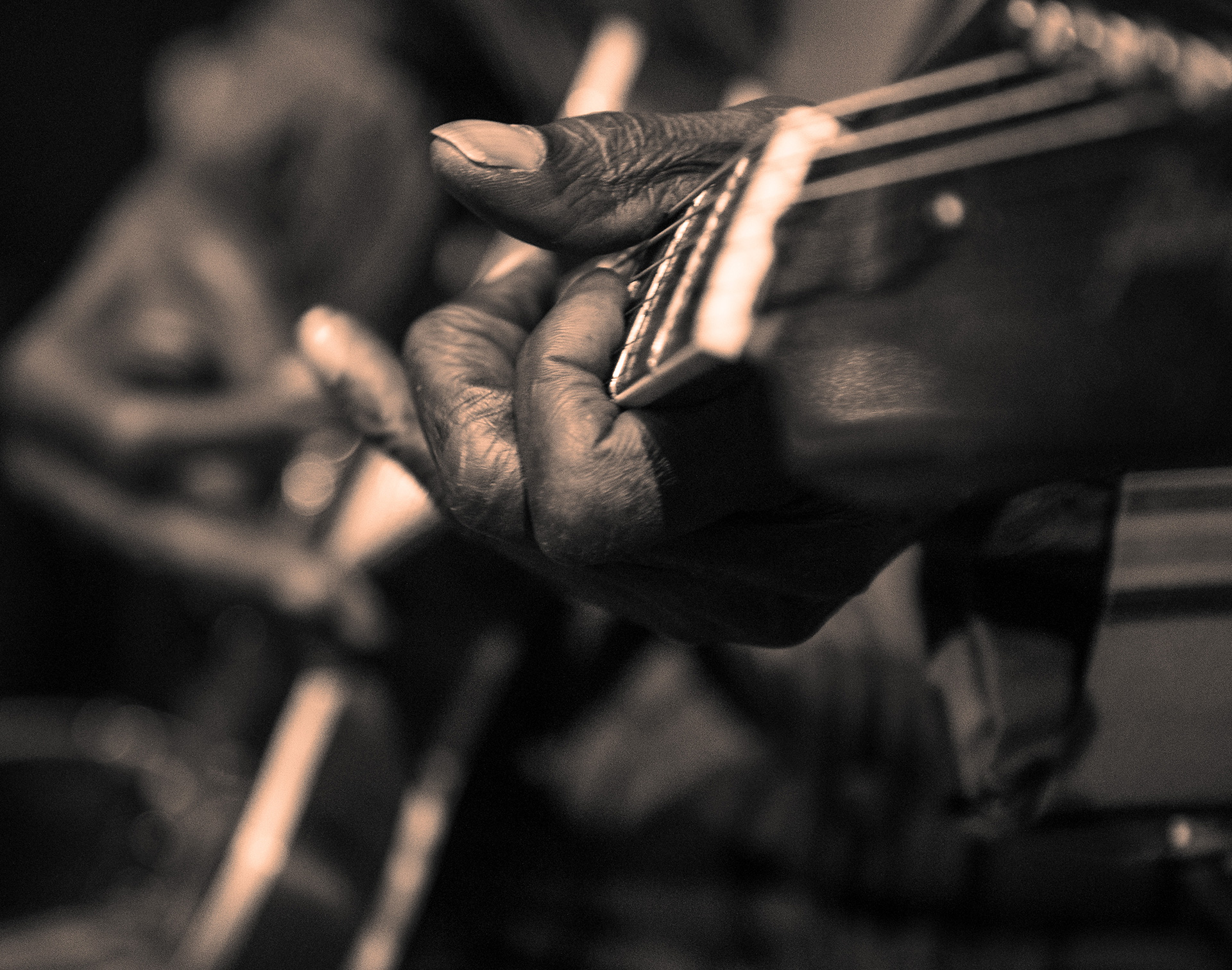 CONDENSED-guitar-hands-BW